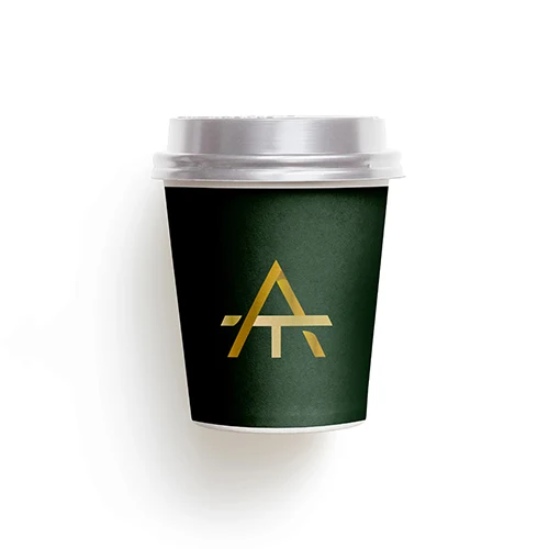 A And T Letters Logo logo on a take-away coffee cup mockup